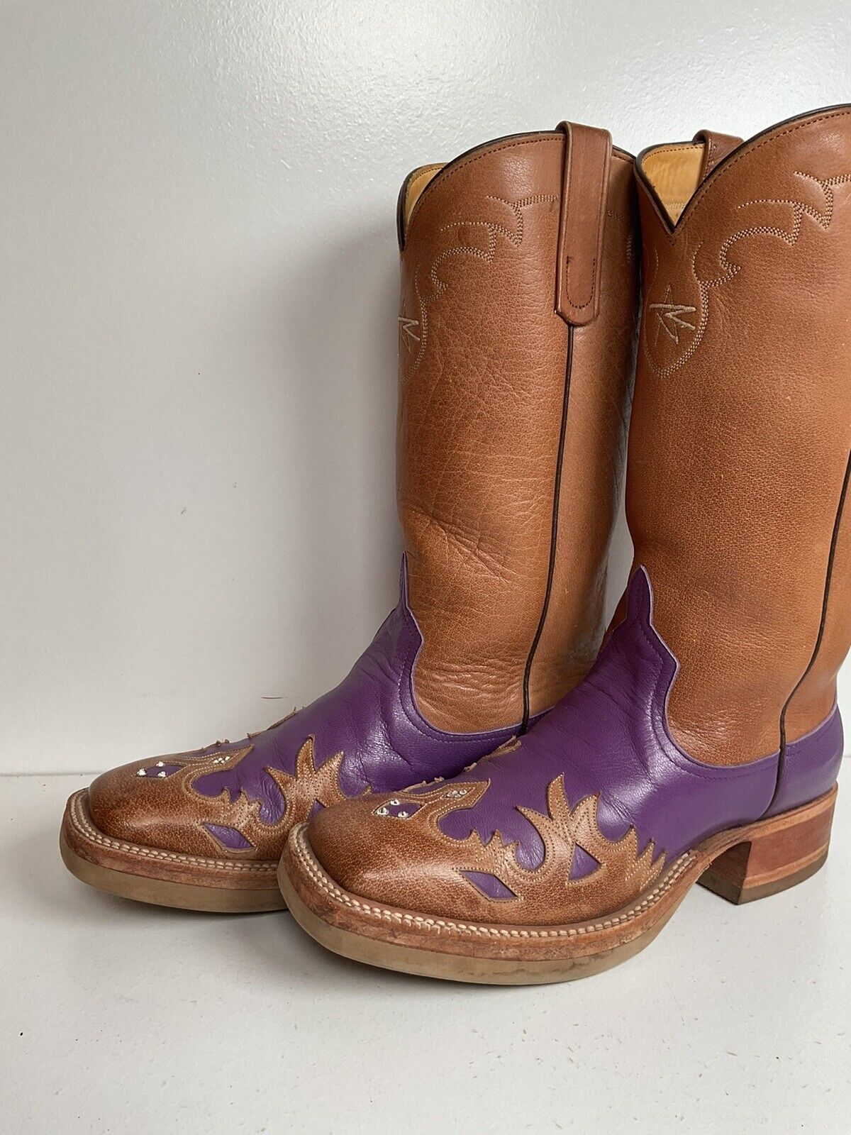 Custom Anderson Bean cowgirl boots in purple, size 7 B, featuring a crepe sole and tooled wingtip overlay for a unique western flair.