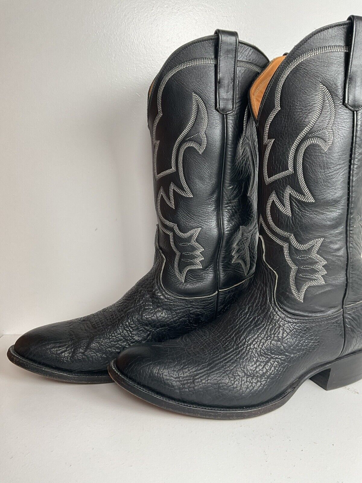 Anderson Bean cowboy boots in black bullhide, size 12 EE, handcrafted in the USA for a durable and classic western look.