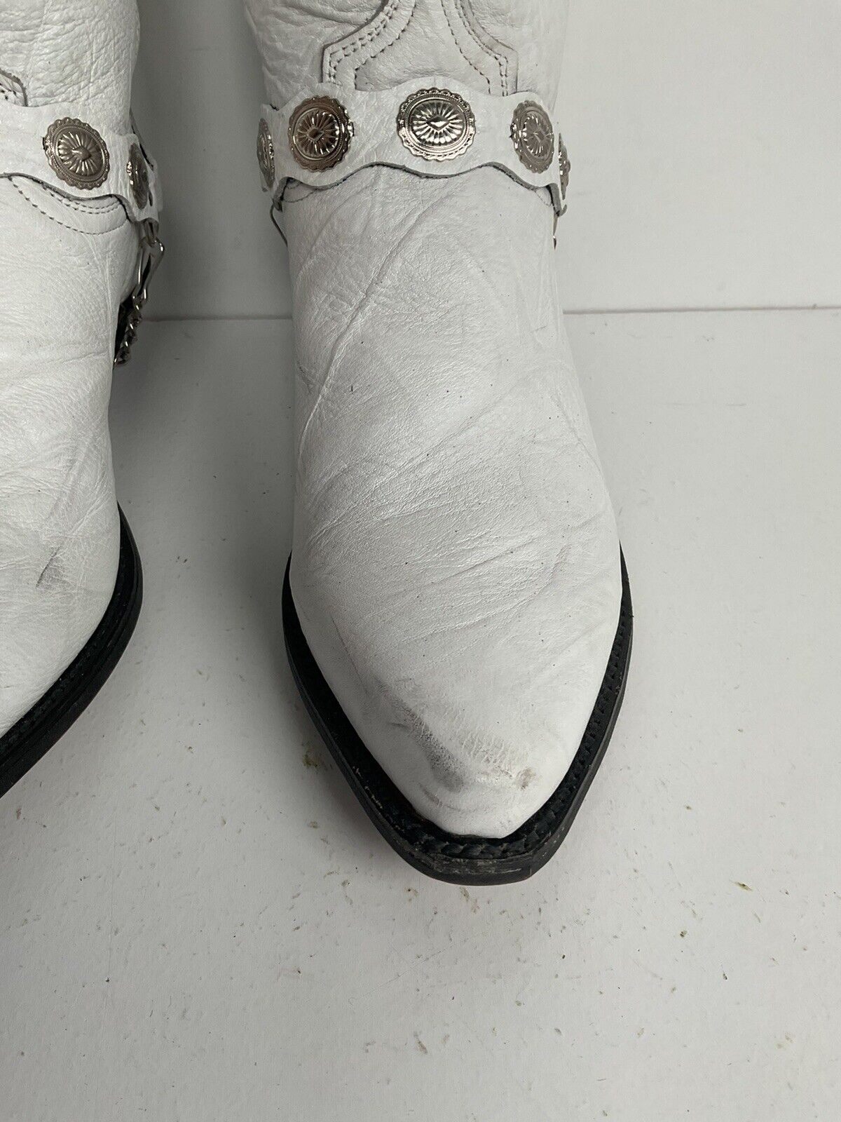 Elegant white cowgirl boots by Abilene, size 7.5 M, with a western harness style, ideal for a wedding.