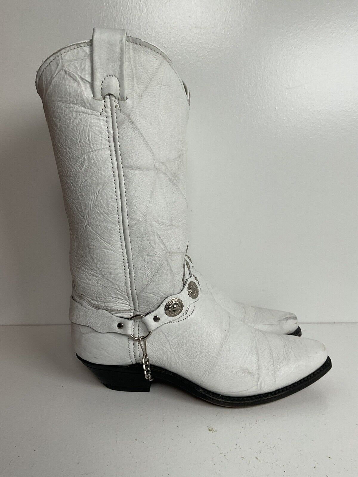 Western-style white wedding boots, size 7.5 M, designed by Abilene with a harness detail for a classic cowgirl vibe.